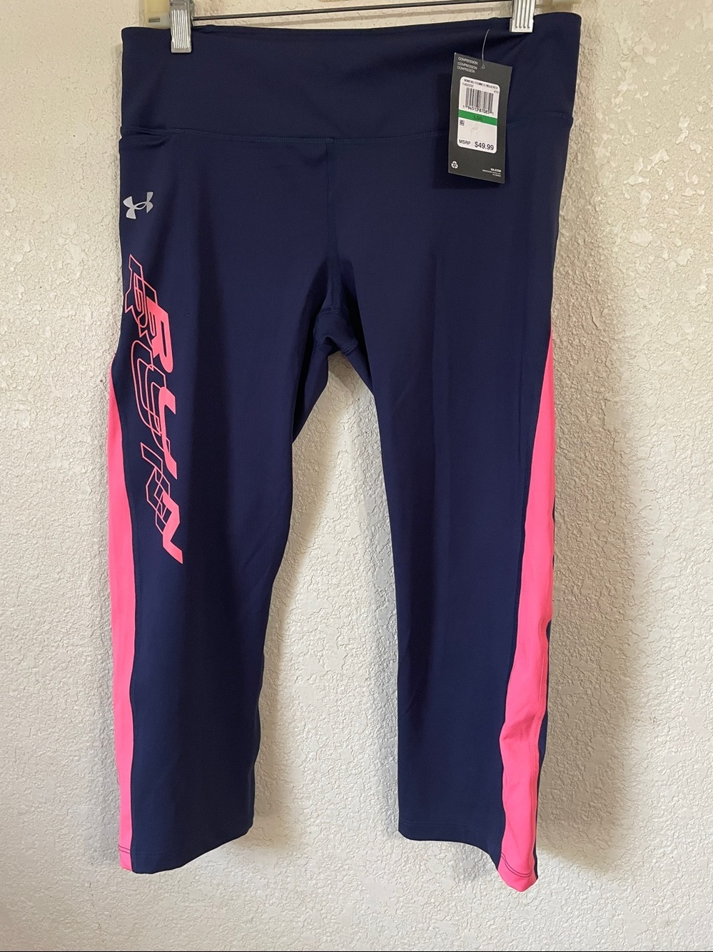 ( NWT) Under Armour Women’s Navy & Hot Pink Performance Leggings